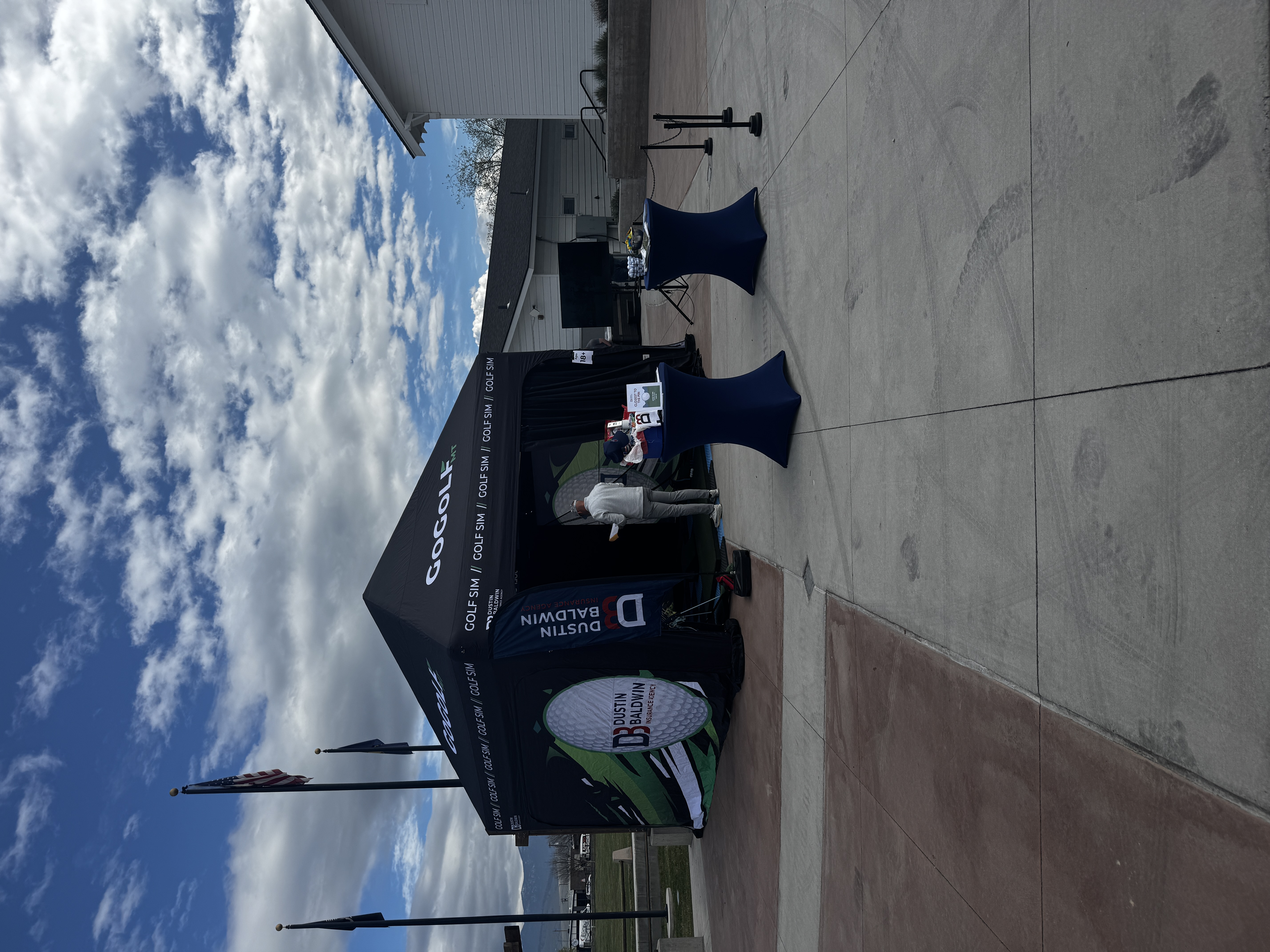 GoGolf MT outdoor golf simulator setup at a Missoula event